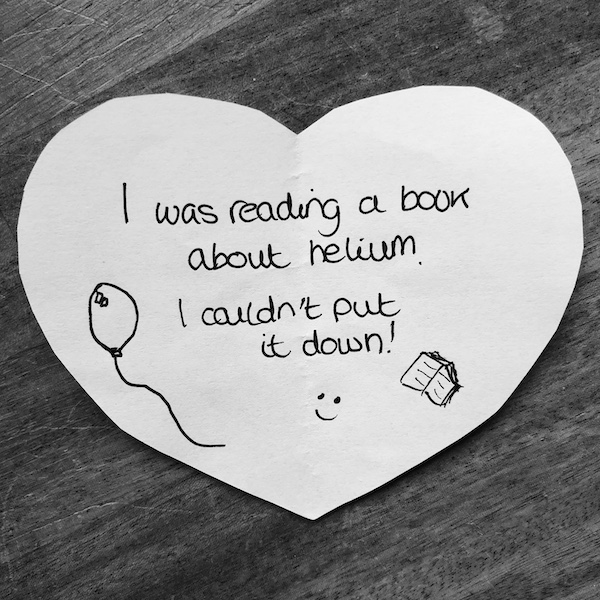 Science joke for kids on a white paper heart: I was reading a book about helium: I couldn’t put it down!